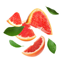 Cut fresh grapefruit and green leaves flying on white background