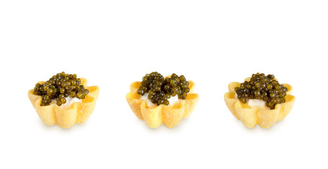 tartlets with black caviar isolated on a white background