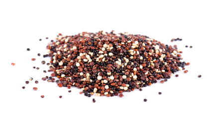 Quinoa seeds isolated on white background. Mix of white, red and black quinoa.