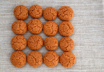 Traditional Italian almond cookies amaretti on a linen background.Famous amarettini cookie biscuits.
Delicious pastry popular in Italy.Selective focus.