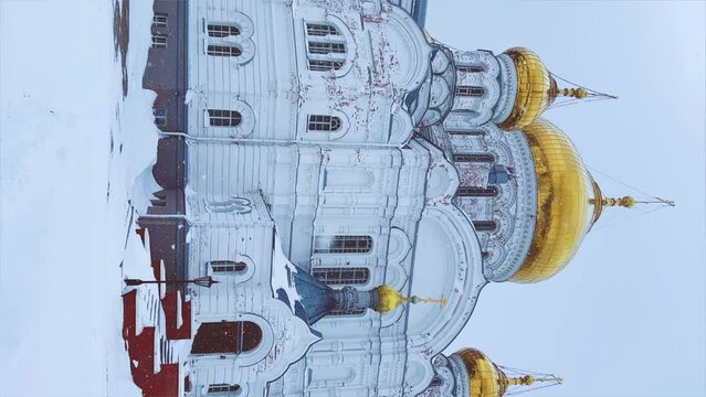Belogorsky St. Nicholas Orthodox Missionary Monastery. Russia, Perm Krai, Belaya Gora. The temple on the hill in winter. Monastery on the background of snow. 4K