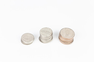 Coins isolated on white background with clipping path and copy space.