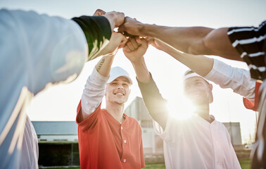 Fist, motivation or sports men in huddle with support, hope or faith on baseball field in fun game together. Teamwork, hands up or group of excited softball athletes with goals, mission or solidarity