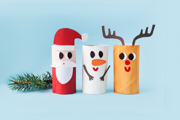 Christmas decoration for winter season. Holiday easy DIY craft idea for kids. Toilet paper roll...