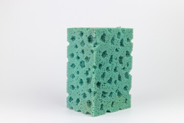 Sponge for washing dishes on a white background. Isolate.