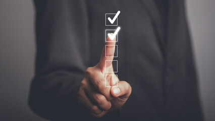 Digital work checklist or electronic smart daily checklist concept. Check mark on virtual screen...