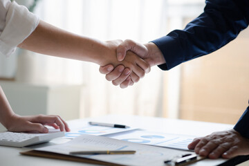 Business investor group holding hands, Two businessmen are agreeing on business together and...