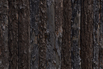 abstract background: detail of fence made of uncouthed planks