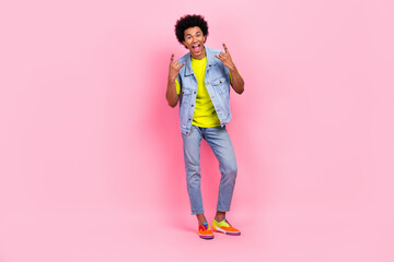 Full length photo of overjoyed glad man wear trendy clothes listen music rock roll have fun rejoice...
