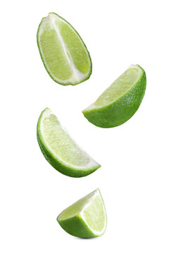 Levitation of lime slices on a transparent background.