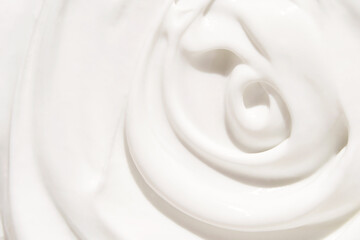 Cosmetic swirl product background. White toothpaste texture. Cleansing face emultion. Milk liquid...