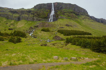 Fototapeta na wymiar Waterfall in Iceland, freedom in wild nature, Bjarnafoss 