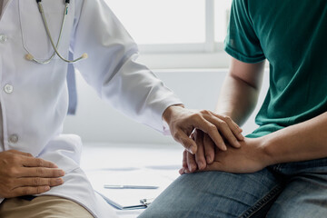male health checkup with doctor Doctors consult about diagnosis of male diseases or mental illnesses in medical clinics or mental health facilities in hospitals.