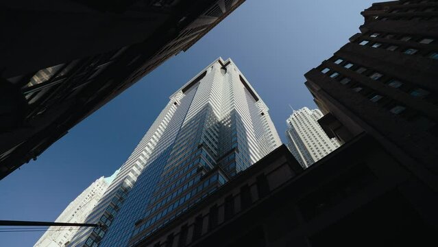 Tracking shot of tall buildings in New York, Financial district