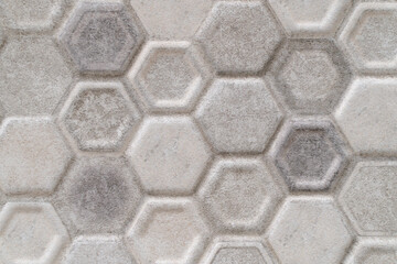 Gray ceramic tile with patterns, interior design, concept of repair, reconstruction, closeup