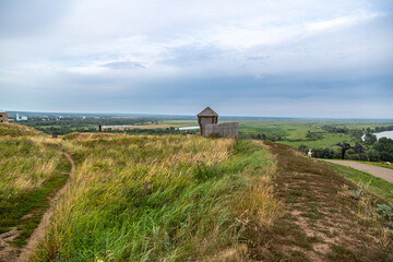 Ancient wooden fortress on a background of river spaces. Russia, Tatarstan, ancient Bulgar fortress in Yelabuga