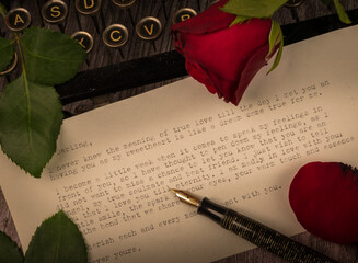 red rose on a love letter
