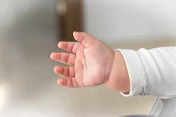 Baby's hand gesturing. Stock Photo.
