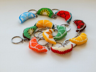 Bead colorful key chains on a white background