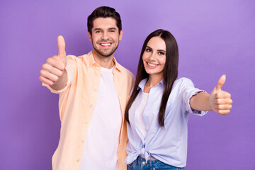Photo of positive two young attractive woman with husband thumbs up recommend new freelance job...