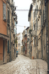 Historic city postcard view - beautiful narrow street of medieval Rovinj Croatia