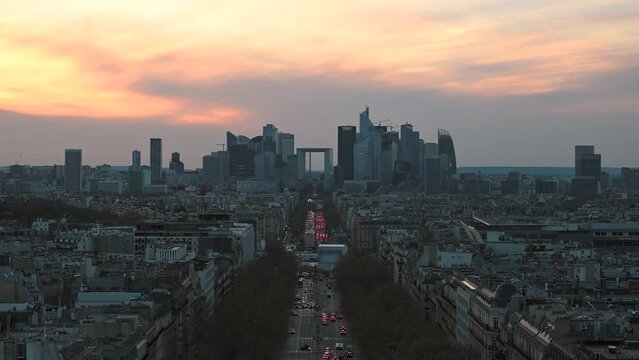 Paris France, high angle view sunset city skyline at La Defense and Champs Elysees street