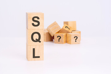 SQL text Structured Query Language on wooden cubes, language concept