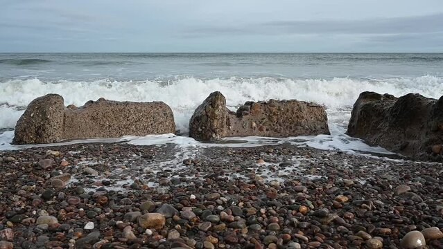 Breaking waves at Kingston on Spey, Scotland