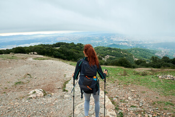 Tourist on a thin curvy road