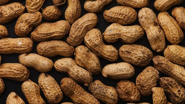 close up of peanuts in shells