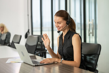businesswoman using laptop conference with customer
