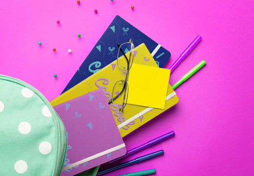 Notebooks in Backpack Mockup