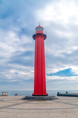 The Cacilhas Lighthouse (Portuguese: Farol de Cacilhas). Red lighthouse in the port of Almada village.