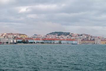 Fototapeta na wymiar Panoramic on Lisbon city on Tagus river. Capital of Portugal.