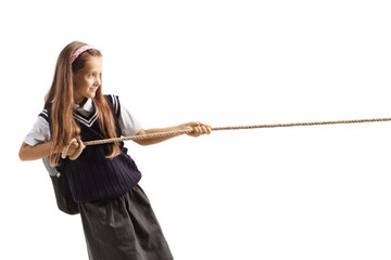 Schoolgirl pulling a rope