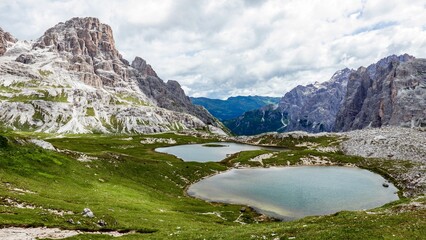 Naklejka na ściany i meble Beautiful landscape of the Tre Cime di Lavaredo mountain range in Dolomites, Italy.