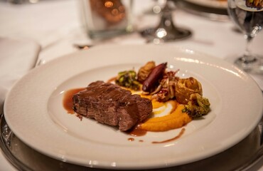 Closeup shot of small portion of delicious meat with sauce