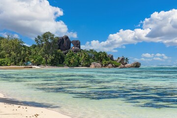 Idyllic tropical sandy beach with granite rock  formations on La Digue island on Seychelles