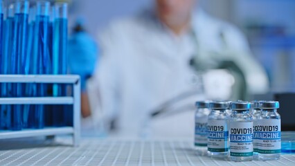 Medical scientist working in laboratory, covid-19 vaccine development, healthcare
