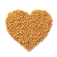 Fenugreek seeds in heart shape isolated on white background