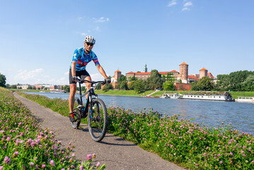 A man on a mountain bike- Cracow- Poland. - obrazy, fototapety, plakaty