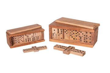 dominoes in wooden case on white background
