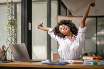 Black woman stretching due to pain from work, tried from work, stretch oneself..