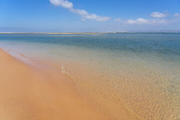 Fototapeta na wymiar Beach in the deserted island in the Formosa estuary natural park in Algarve region, Portugal