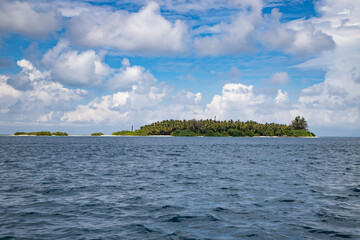 green tropical island in the sea