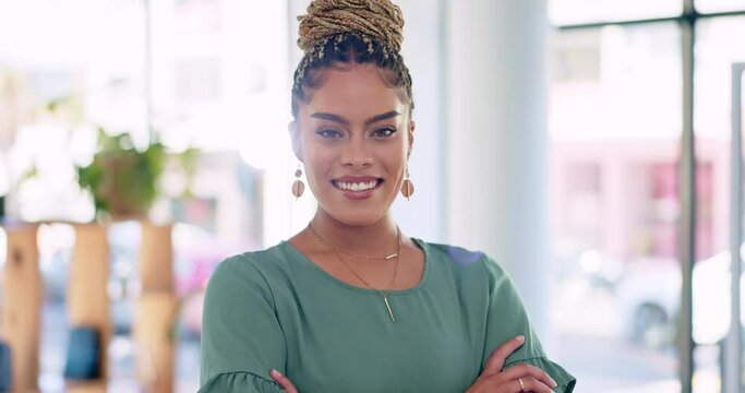 Face, happy and proud business woman in office, confident and empowered against blurred background. Portrait, smile and lady leader excited for startup, company and career goal with ambitious mindset