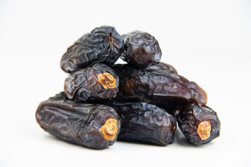Dates isolated on white background, amber dates, Ramadan food, front view, noise effect, Noise and Pollution Effect on photos