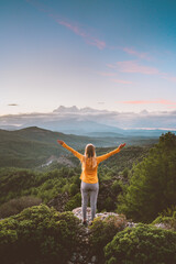 Woman tourist outdoor hiking solo enjoying sunset mountains view travel healthy lifestyle girl...