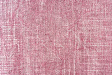 Natural pink linen fabric texture background. Flax cloth surface, tablecloth, upholstery, curtains textile. Top view, close up