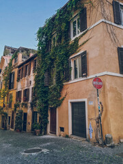 Green facade in Trastevere, Rome, Lazio, Italy Charming street in Trastevere